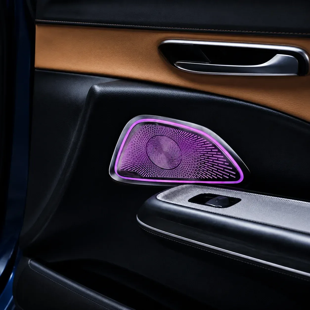 Illuminated midrange speaker covers installed in the front doors of a Mercedes-Benz E-Class W214